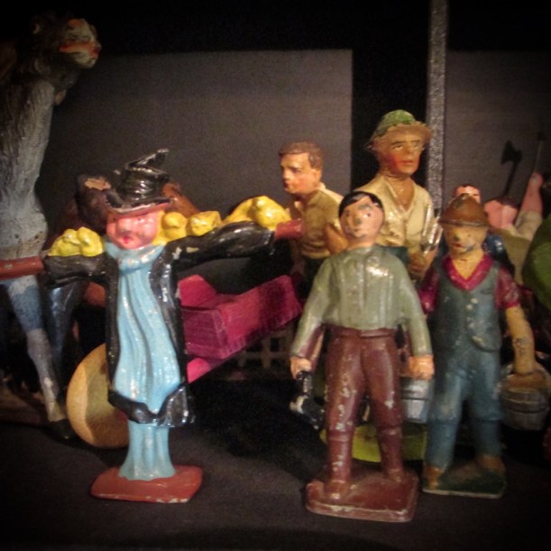 Farmers and a scarecrow